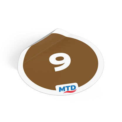 Circular vinyl sticker featuring the MTD Route 9 bubble in brown with a bold route number and MTD logo.