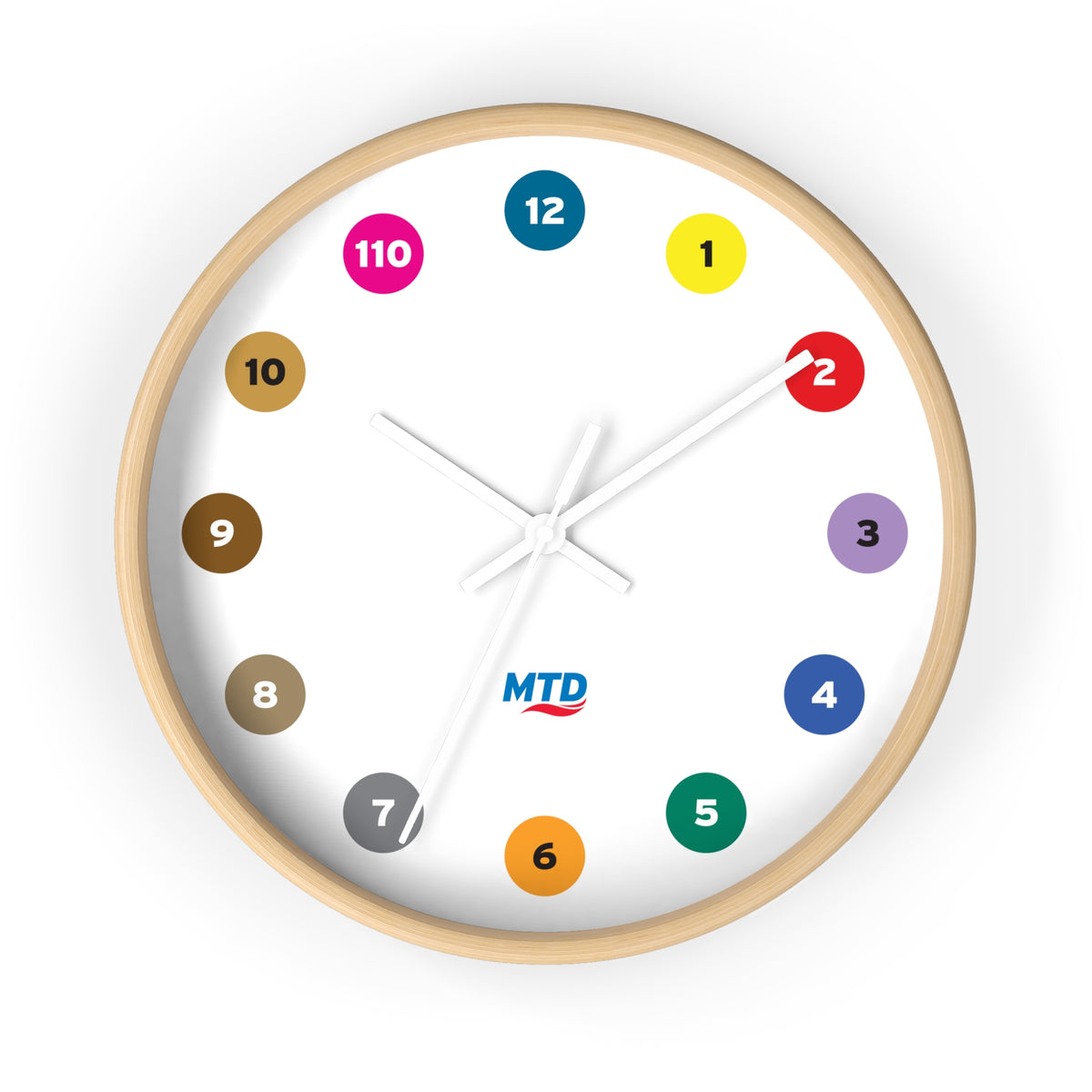 Primary Alt Text Round wall clock featuring colorful MTD route bubbles arranged as hour markers on a white clock face with the MTD logo in the center.