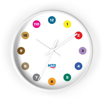 Primary Alt Text Round wall clock featuring colorful MTD route bubbles arranged as hour markers on a white clock face with the MTD logo in the center.