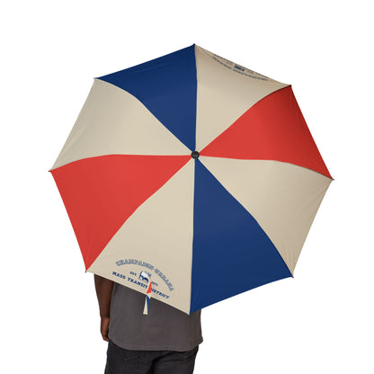 Retro-style umbrella featuring MTD's historic 1971 logo on an eight-panel canopy with vintage-inspired colors and branding.