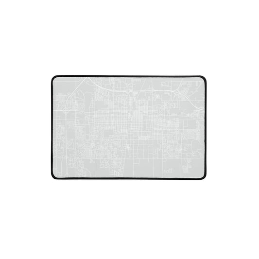Gray rectangular desk mat with white outline of streets in Champaign-Urbana, Illinois.