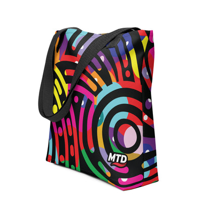 Tote bag with EKAH’s mural design and black handles.