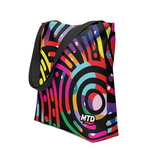 Tote bag with EKAH’s mural design and black handles.