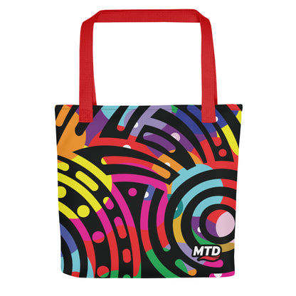 Flat tote bag with EKAH’s mural design and red handles.