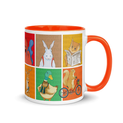 White ceramic mug with orange handle featuring EKAH animal illustrations. 