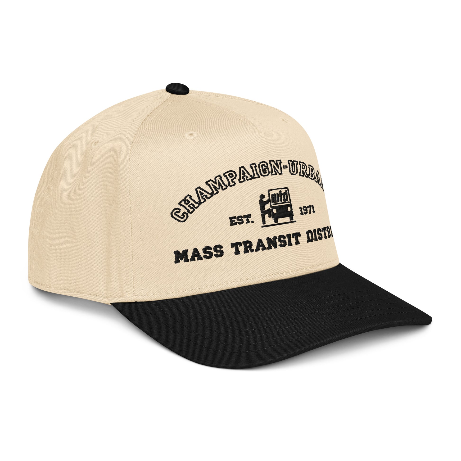 Side view of a tan snapback hat featuring a throwback MTD logo stitched in black with a black visor.