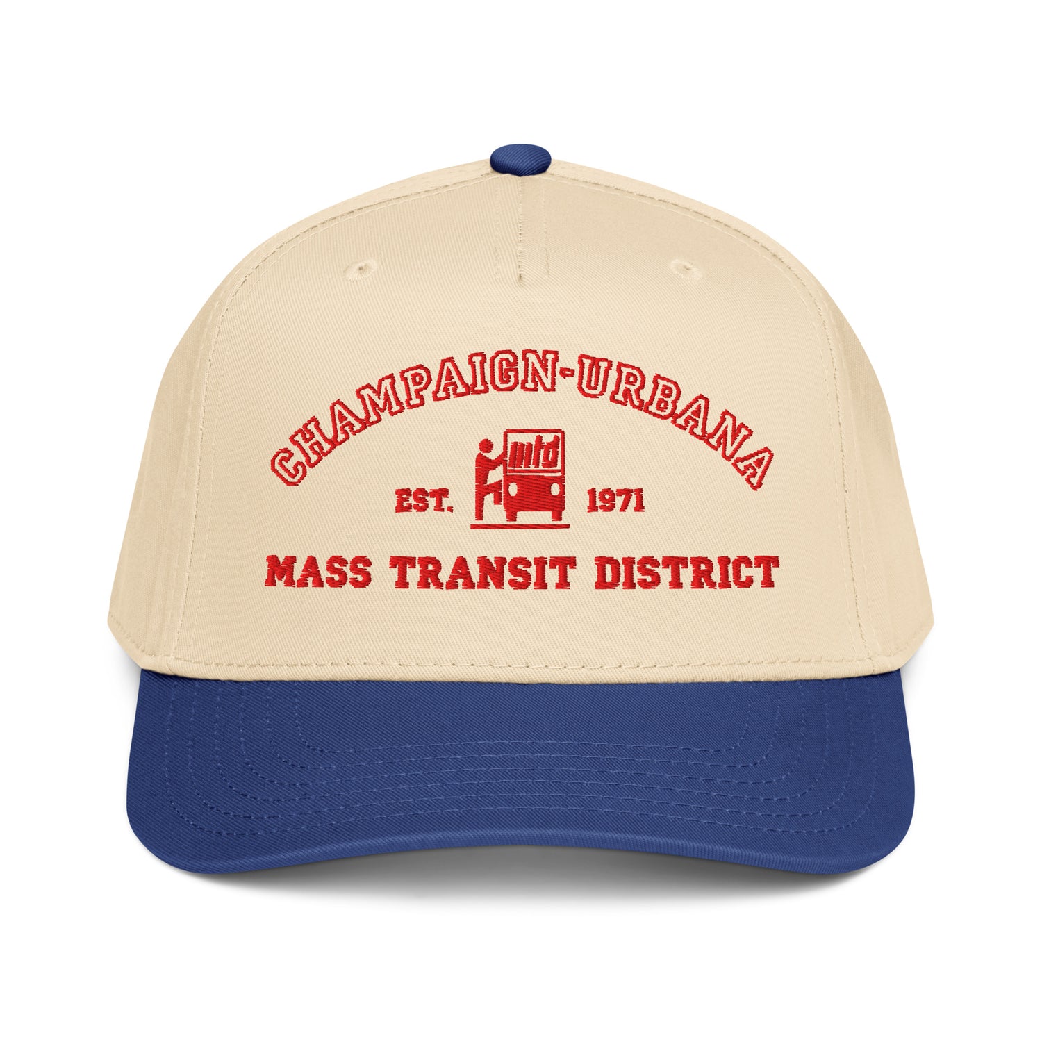 Front view of a tan snapback hat featuring a throwback MTD logo stitched in red with a blue visor.