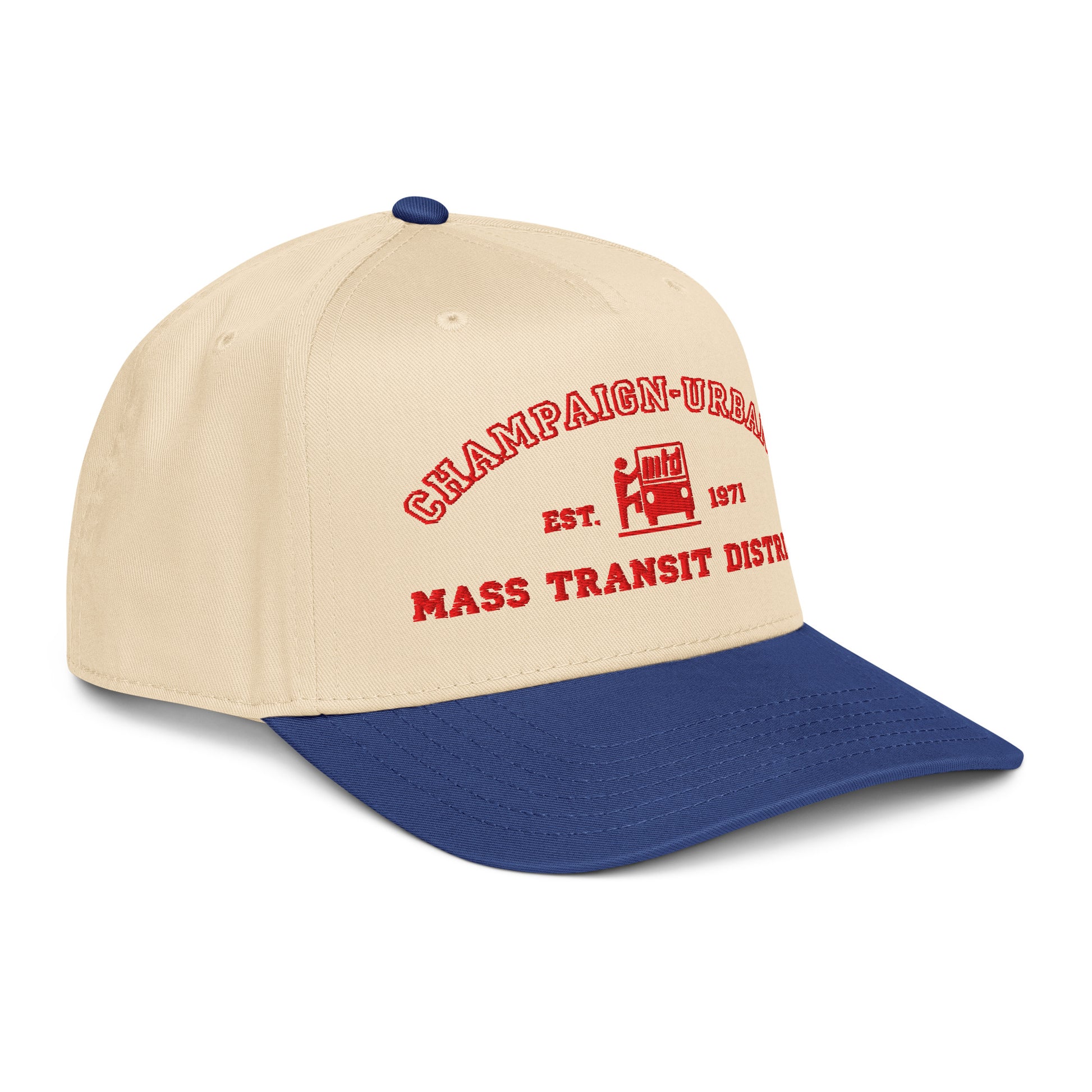 Side view of a tan snapback hat featuring a throwback MTD logo stitched in red with a blue visor.